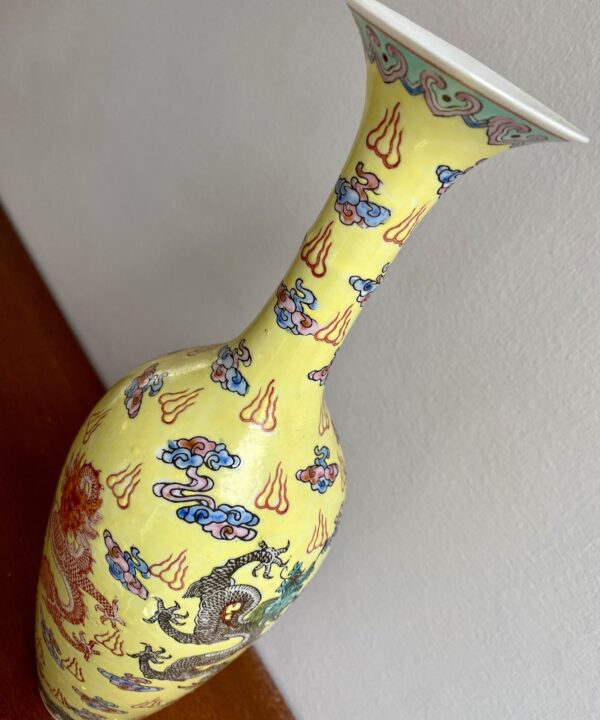 Delicate yellow Chinese bottle vase with dragon motifs