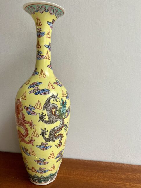 Pale yellow Chinese porcelain bottle with dragon.