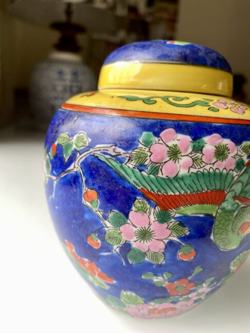 Bright primary colours on a vintage pottery jar from Japan.