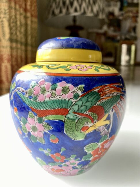 Brightly-coloured vintage Japanese pottery jar with lid