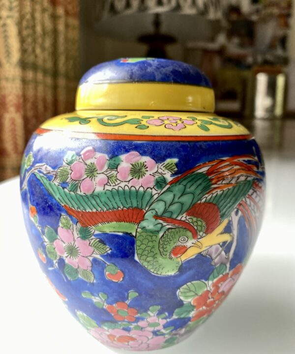 Brightly-coloured vintage Japanese pottery jar with lid