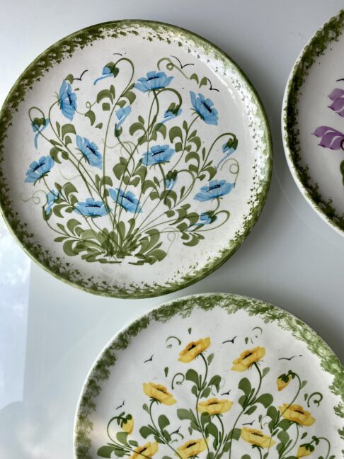 A selection of botanical design vintage wall plates.