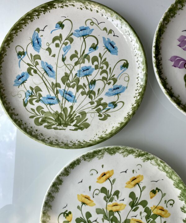 A selection of botanical design vintage wall plates.