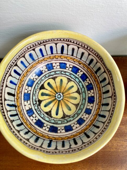 Vintage Italian pottery dish with pretty, hand-painted pattern.