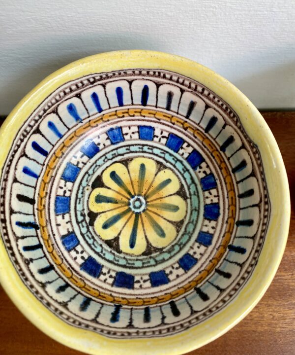 Vintage Italian pottery dish with pretty, hand-painted pattern.