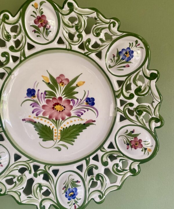 A charming vintage floral wall plate from Portugal.