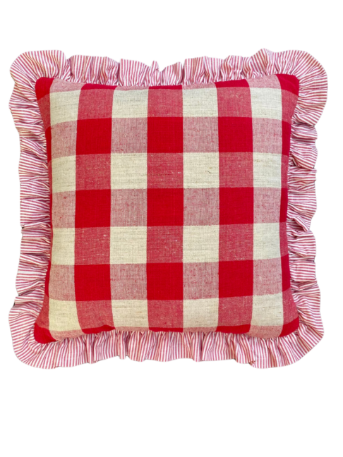 A red and white check cushion in French vintage linen with a striped frill.