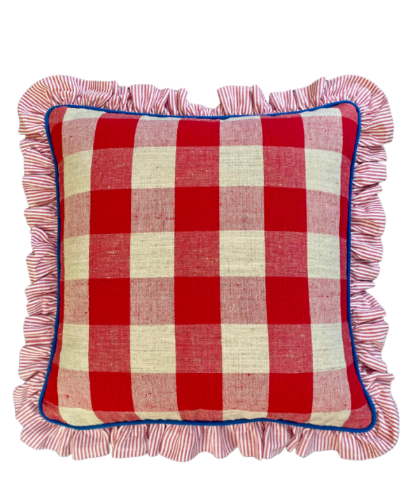 Large red check cushions with frills in vintage French linen check with a striped ruffle and blue piping.