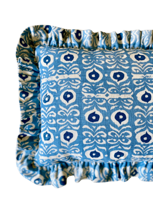 Navy and pale blue hand-printed linen cushion with frill. Iznik-inspired design.