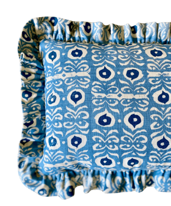 Navy and pale blue hand-printed linen cushion with frill. Iznik-inspired design.