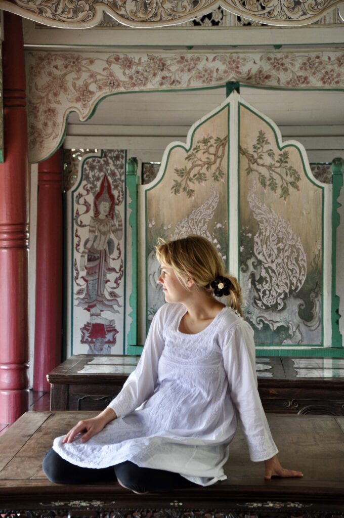 Beautiful hand-painted interiors in traditional wooden houses at Ancient Siam in Thailand.