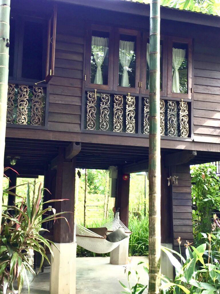 A traditional wooden Thai house on stilts in Chiangmai Thailand.