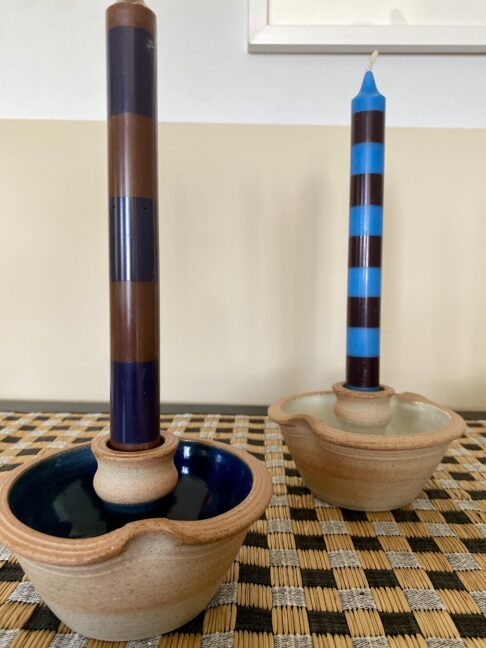 Blue or ivory glazed candle holders handmade in Scotland. Use the bowls to display flowers!
