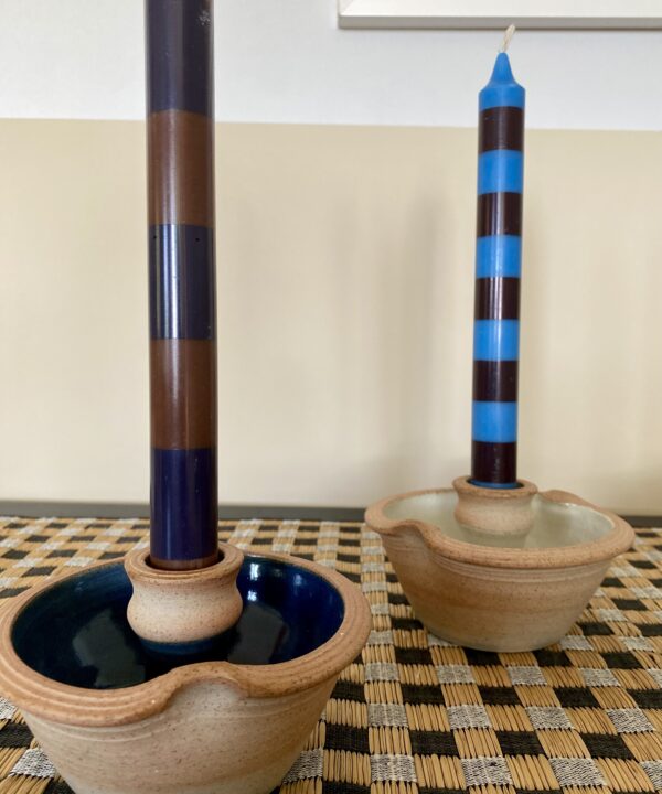 Blue or ivory glazed candle holders handmade in Scotland. Use the bowls to display flowers!