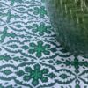 Vibrant green tablecloth, perfect for al fresco dining.